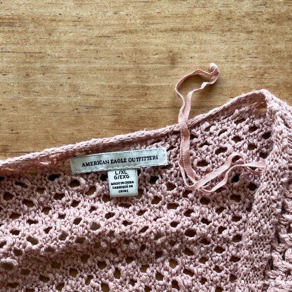 Lightweight open knit cover up. Dolman arms with fringe on the ends. - Picture 2 of 3